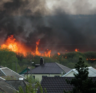 wildfire near houses